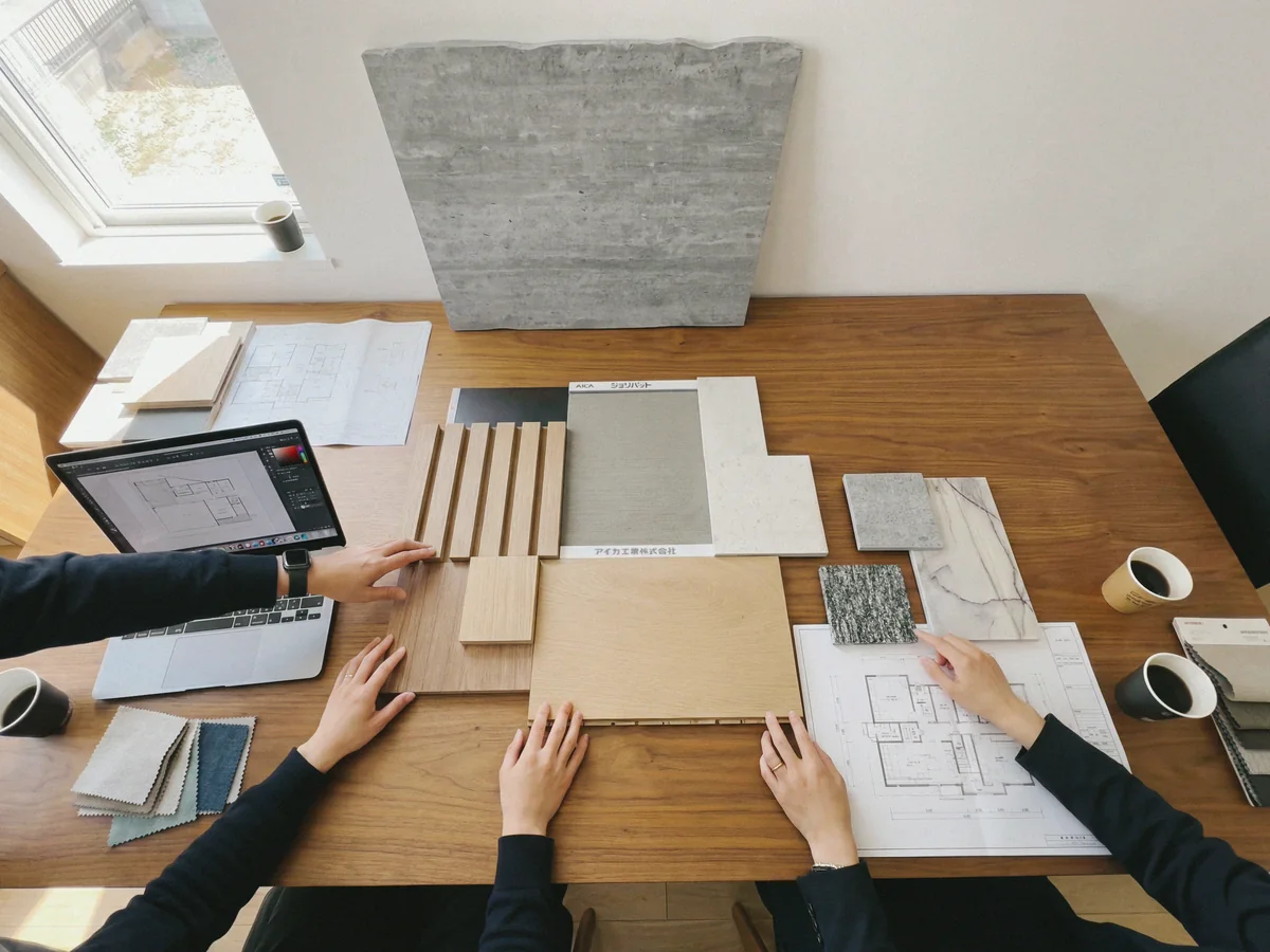 A material meeting over drawings and samples