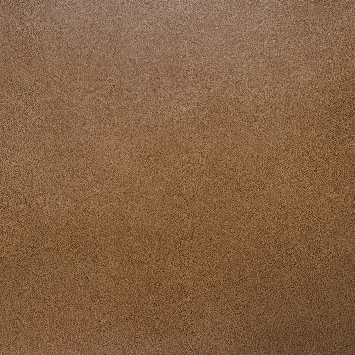 Burnt Amber — Full-grain · Italian leather upholstery texture