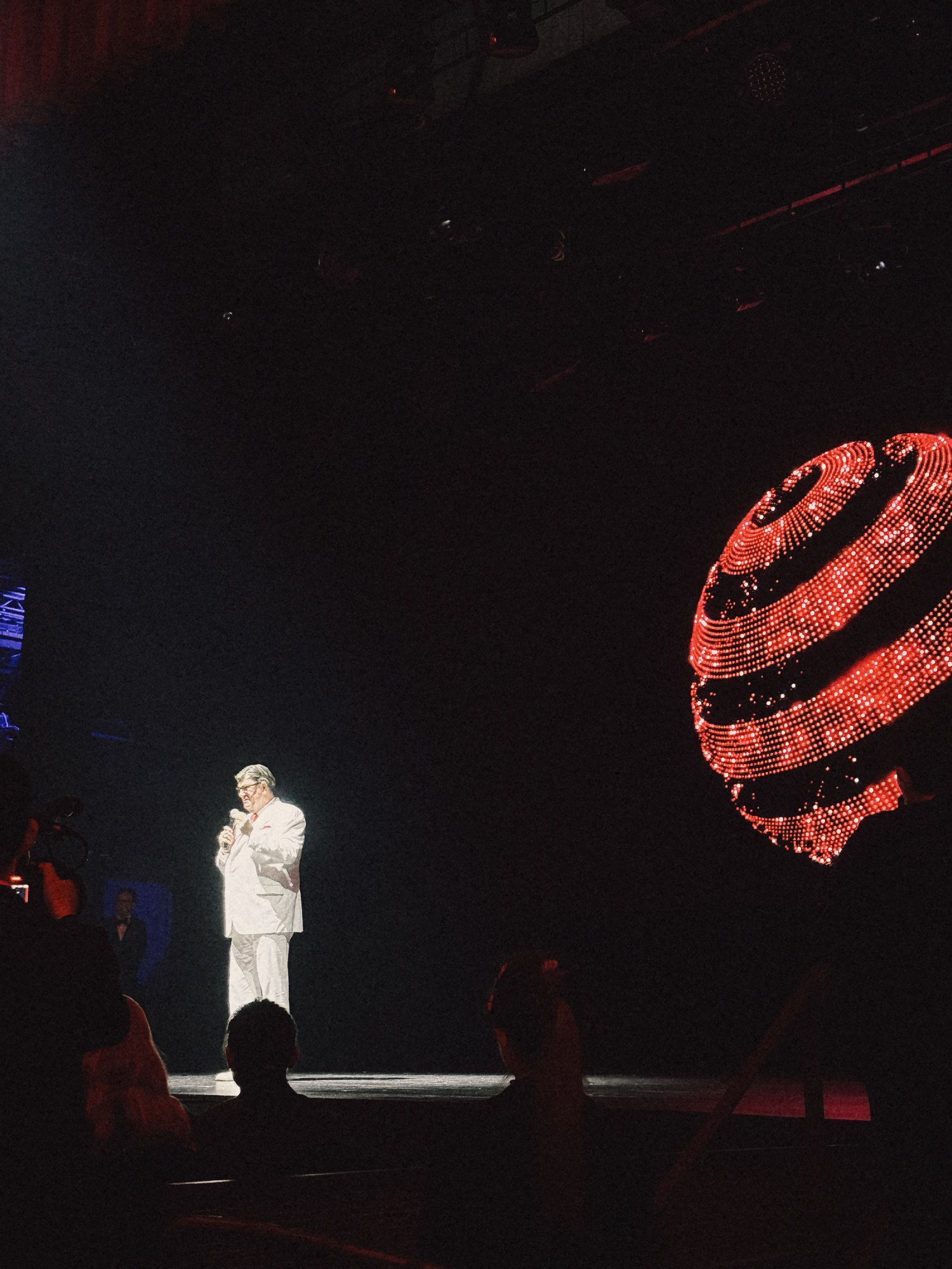 Red Dot Award: Design Concept 2026 ceremony on stage at Capitol Theatre, Singapore, with the illuminated Red Dot sphere