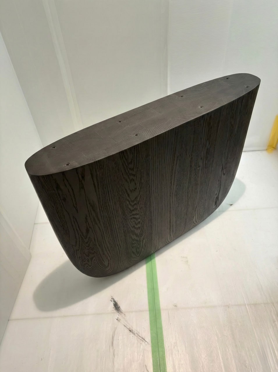 ENWA edge detail — charcoal finish on solid oak