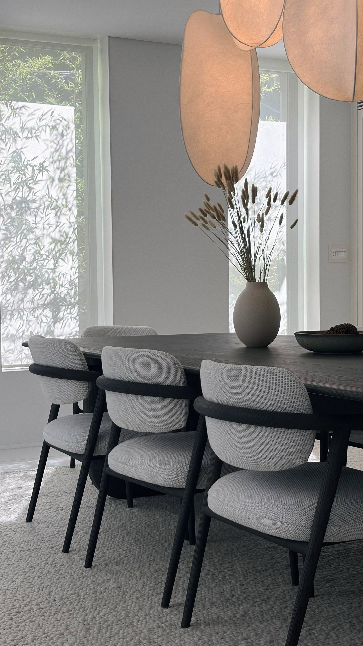 Sen Dining Table at seated height with pendant lighting