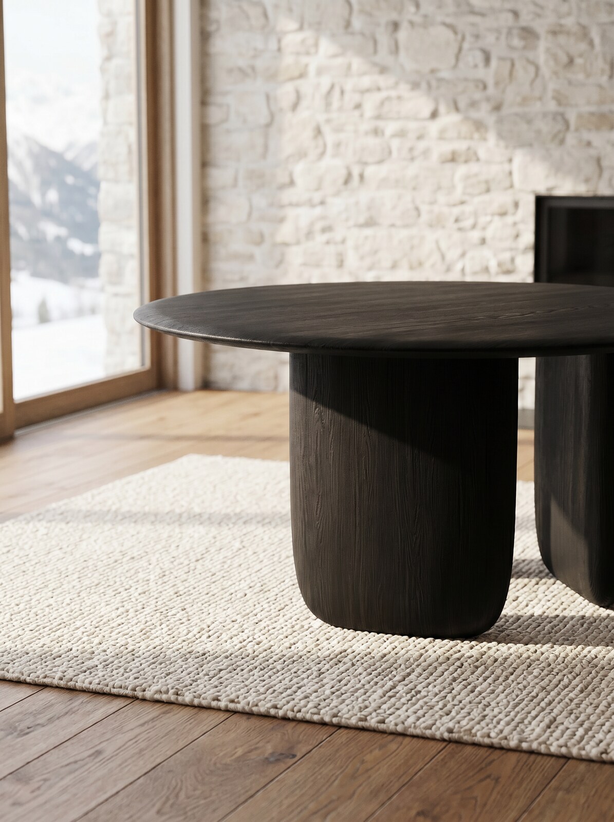 Maru Dining Table — base meeting the rug