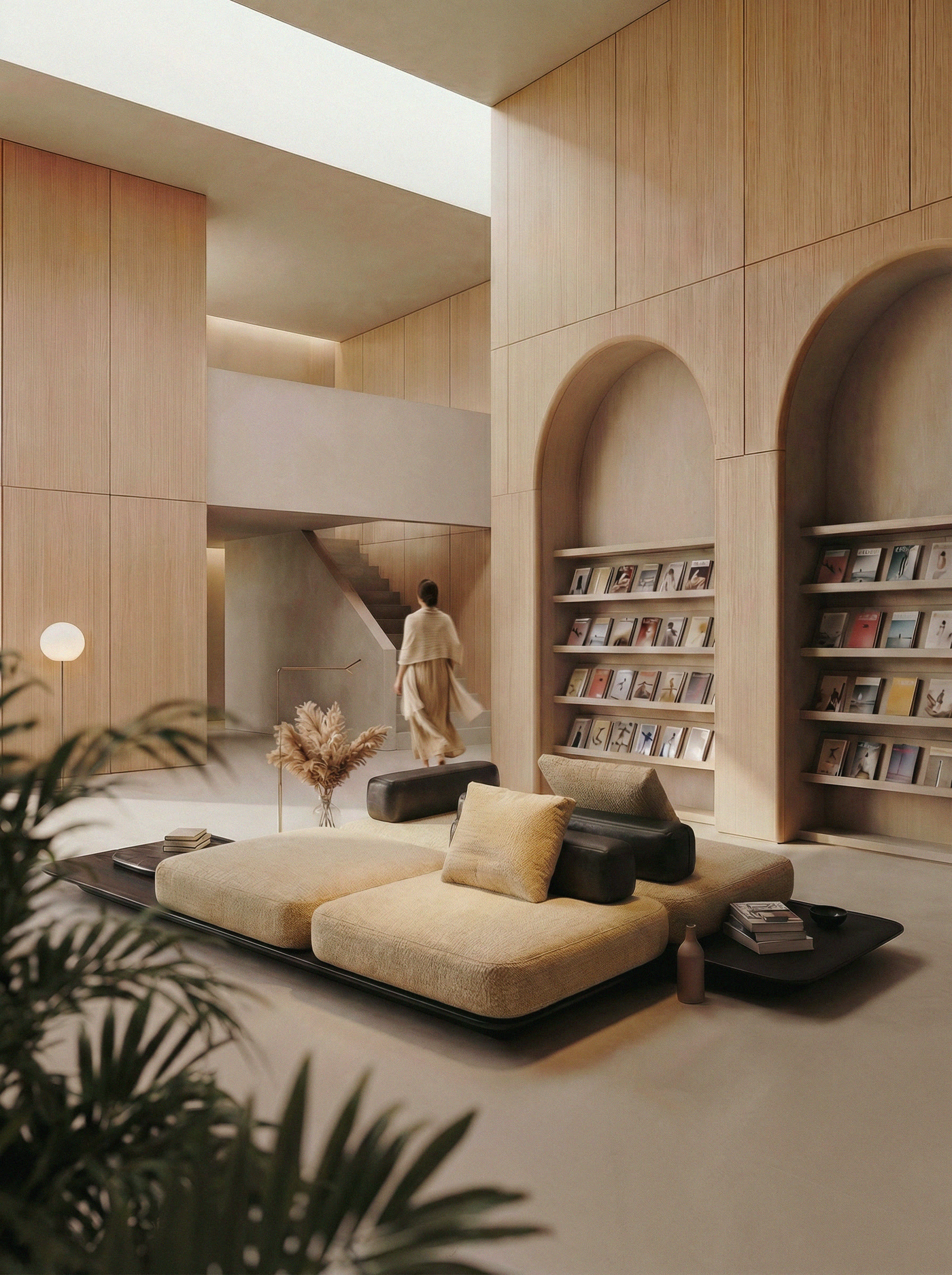 Sora Sofa in double-height living space with oak paneling and library