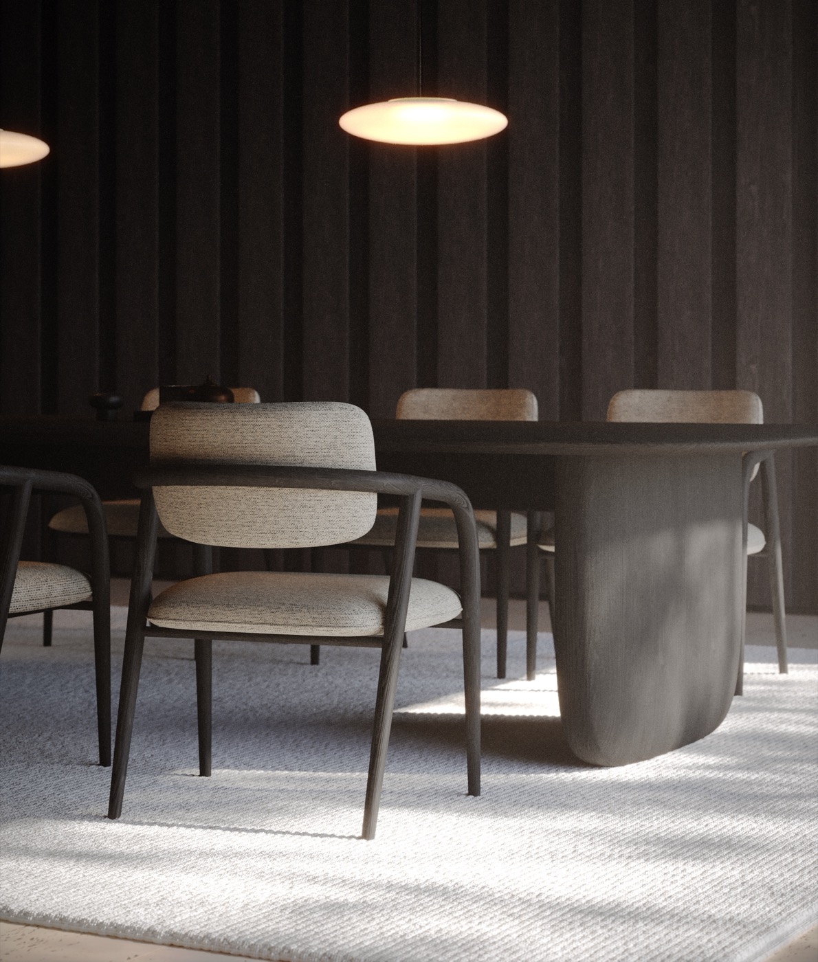 Seated at the Yume Chair, soft daylight