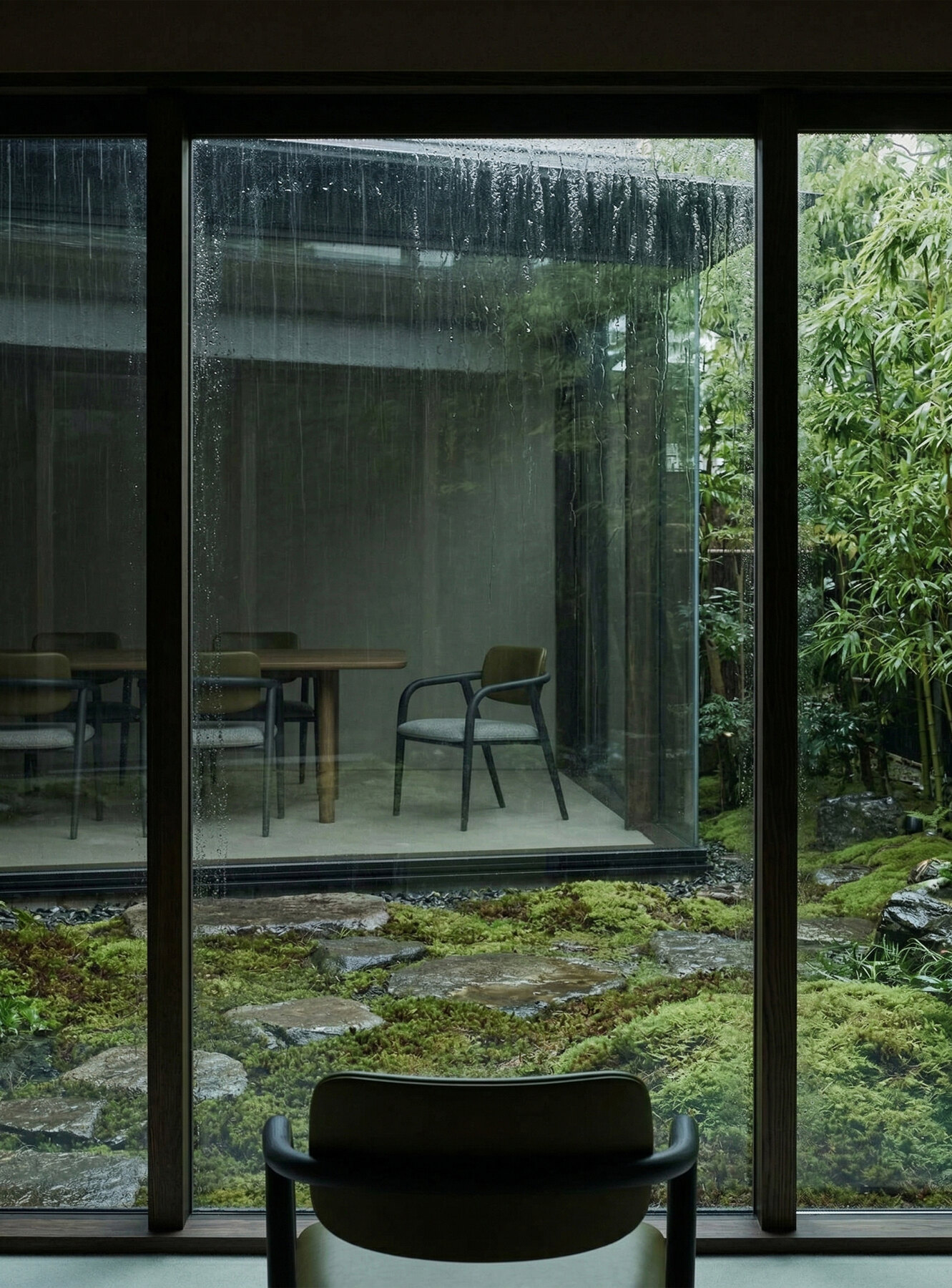 Yume Chairs around an oak dining table in a warm plaster interior